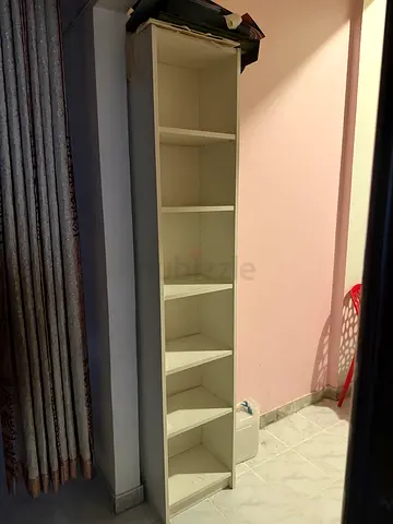 Tall White Corner Bookshelf