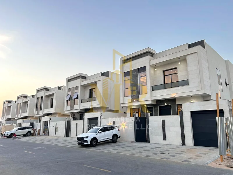 🏡 For Sale: Elegant Villa in Al Bahia – Ajman | 2 Floors + Rooftop | 5 Master Bedrooms | Majlis + Master Living Room | AED 1,650,000 (Including Centr63883087812225113