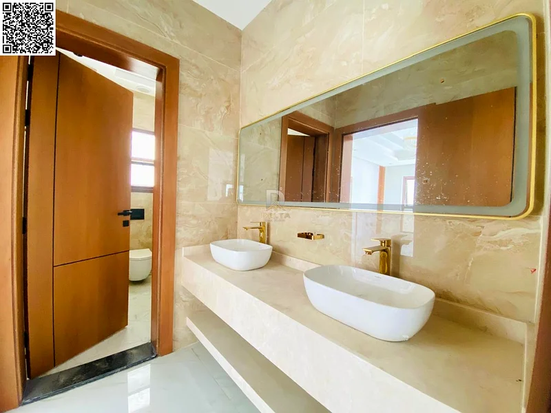 For sale - Luxury villa in Al Bahia, Ajman | Two floors and a roof | External courtyard | Including registration and ownership fees. Freehold for all63883087778178114