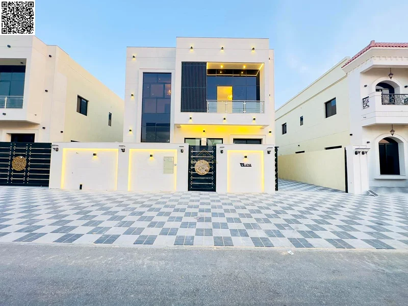 Villa for sale in Al Helio 2, Ajman, 5 master bedrooms with built-in wardrobes, a hall, two halls, and a spacious kitchen63909552285827111