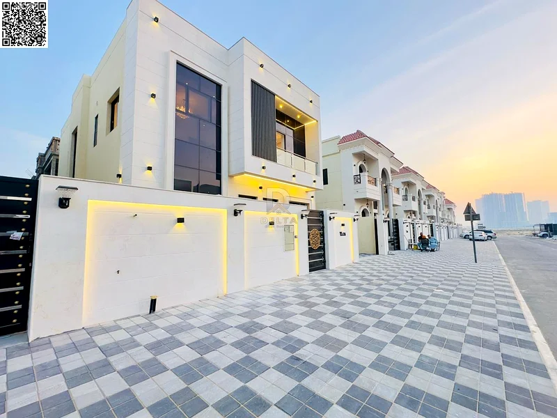 Villa for sale in Al Helio 2, Ajman, 5 master bedrooms with built-in wardrobes, a hall, two halls, and a spacious kitchen63909552285827113