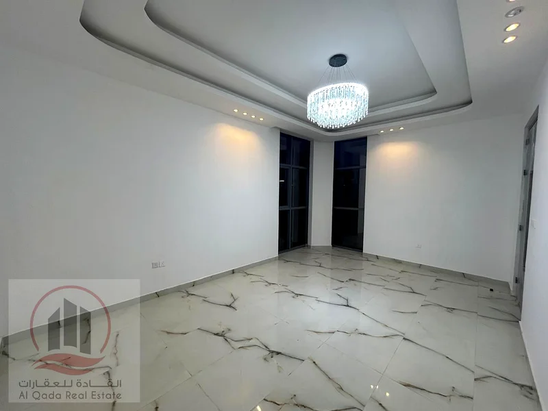 For sale, a corner villa in Ajman Al Helio, 5 master bedrooms, a living room, a hall, and a maid's room. Freehold for all n63909333994625114