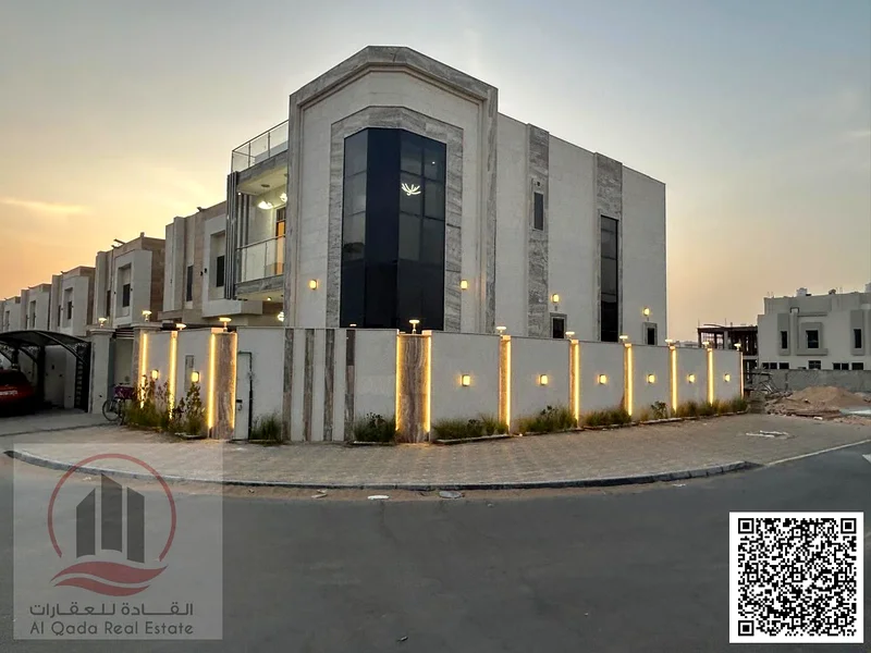 For sale, a corner villa in Ajman Al Helio, 5 master bedrooms, a living room, a hall, and a maid's room. Freehold for all n63909333994625110