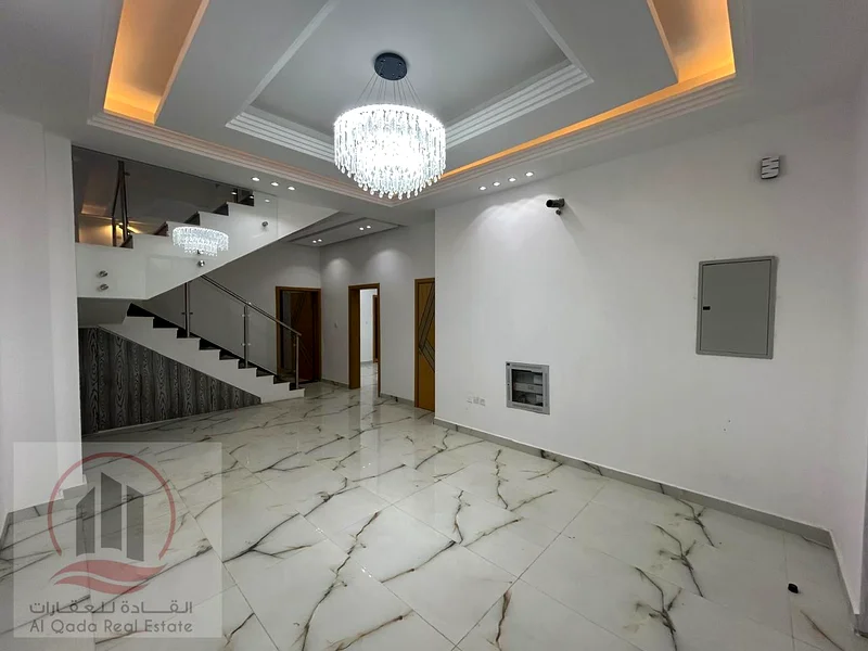 For sale, a corner villa in Ajman Al Helio, 5 master bedrooms, a living room, a hall, and a maid's room. Freehold for all n63909333994625112