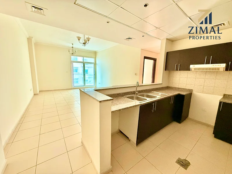 Spacious 1 Bedroom with Balcony | Free Parking | Well-Maintained Building.63728720952322111