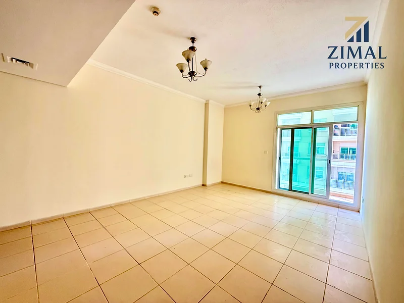 Spacious 1 Bedroom with Balcony | Free Parking | Well-Maintained Building.63728720952322112