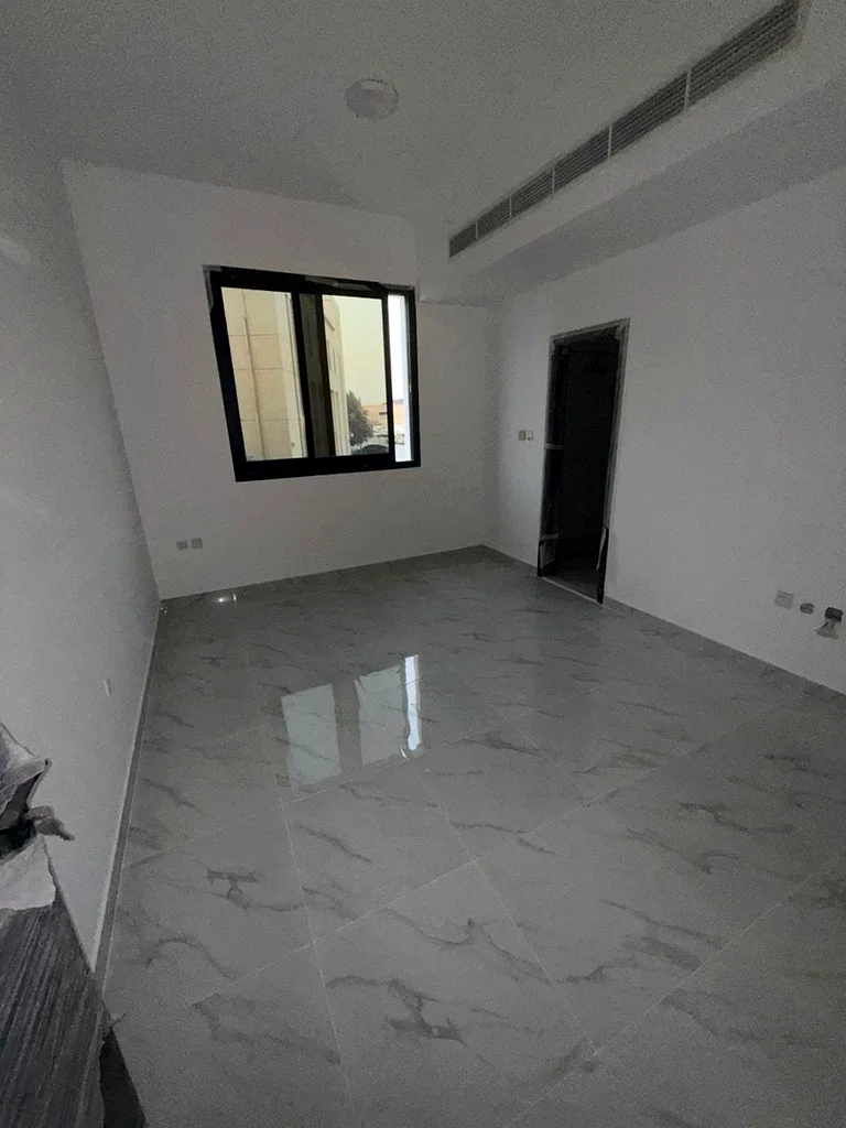 One bedroom, one hall, two bathrooms, built-in wardrobes, first tenant, open view, spacious areas, and a very excellent location63719147362818113