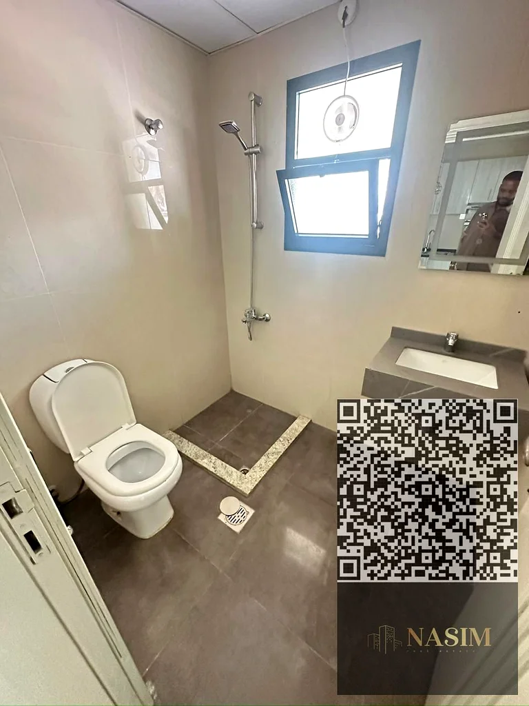 شقة بغرفة نوم واحدة وغرفة معيشة للإيجار في الرشيدية 2 – خلف أبراج الفالكون63721701077634112