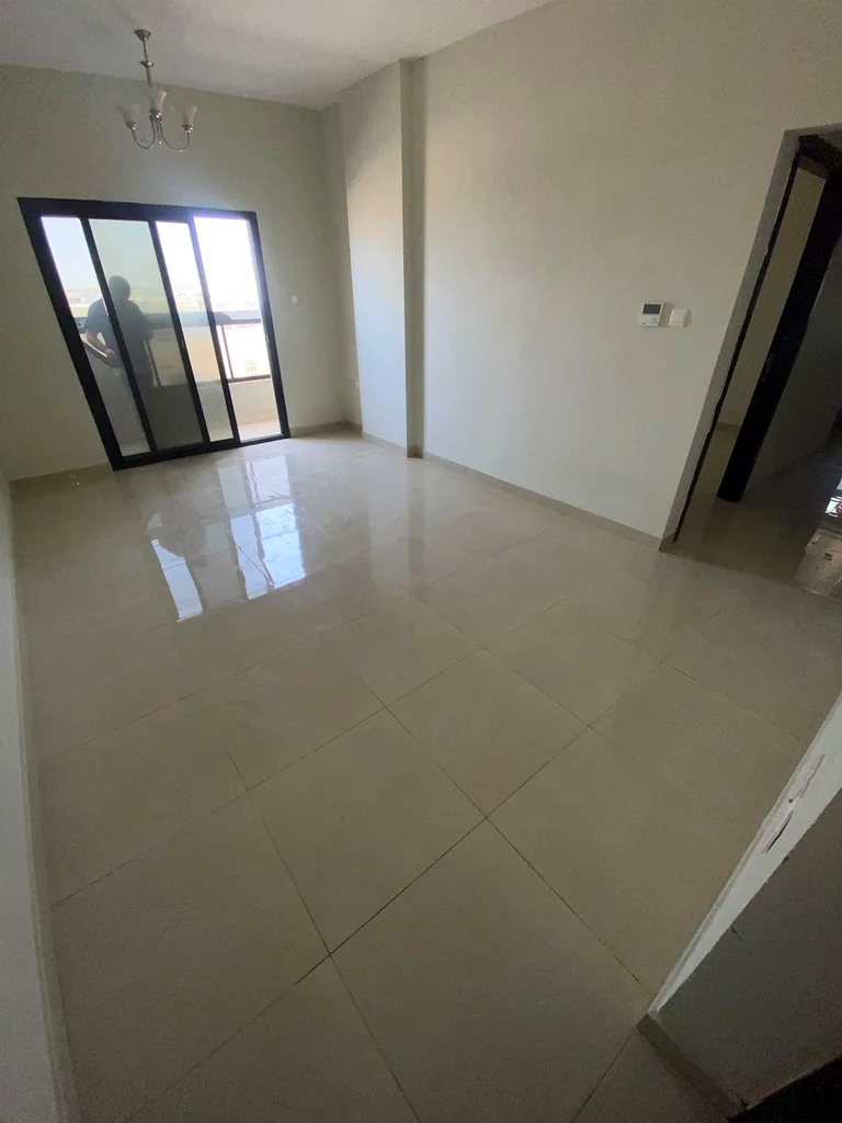 Two rooms and a hall with two bathrooms with a balcony with an excellent, open and high view. A distinguished location in Al Jurf 3, close to the Chin63713506107393110
