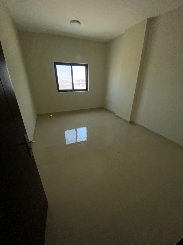 Two rooms and a hall with two bathrooms with a balcony with an excellent, open and high view. A distinguished location in Al Jurf 3, close to the Chin63713506107393112