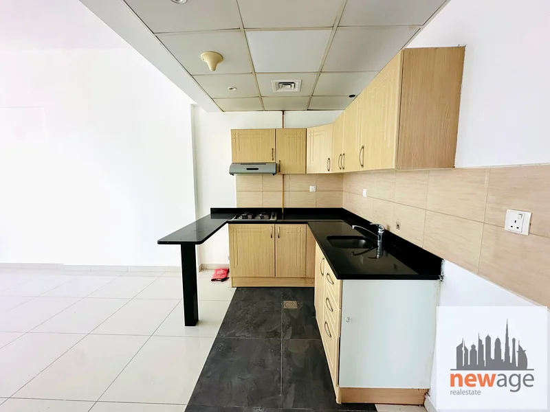 شقة كبيرة بغرفة نوم واحدة للإيجار في مدينة دبي الرياضية63735205977731113