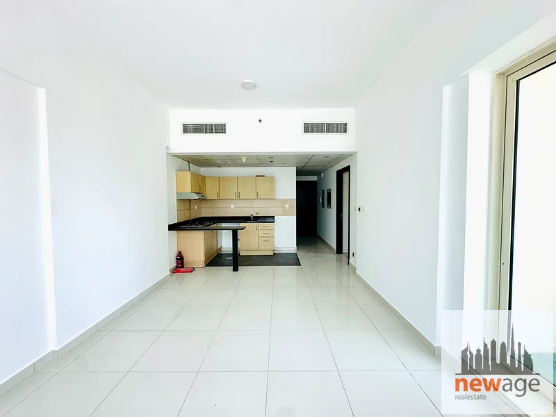 شقة كبيرة بغرفة نوم واحدة للإيجار في مدينة دبي الرياضية63735205977731112