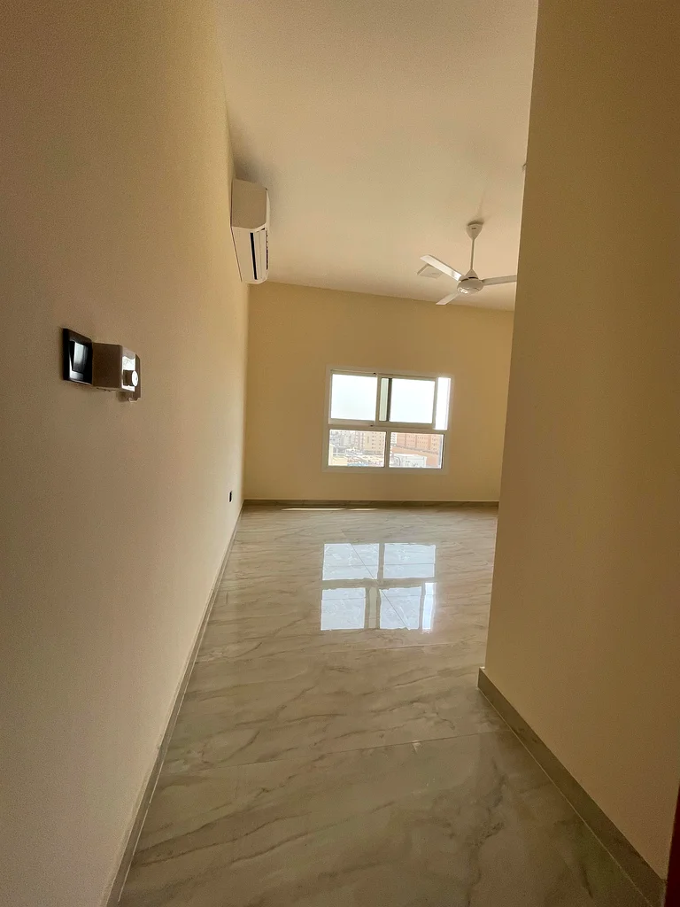 Two bedrooms, a hall, two bathrooms, a balcony with an excellent, open, and high view. First tenant. Super deluxe finishes. A prime location in Al Jur63713506132739111