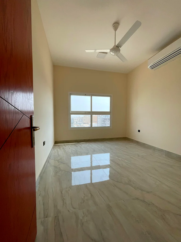 Two bedrooms, a hall, two bathrooms, a balcony with an excellent, open, and high view. First tenant. Super deluxe finishes. A prime location in Al Jur63713506132739114