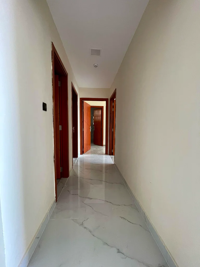 Two bedrooms, a hall, two bathrooms, a balcony with an excellent, open, and high view. First tenant. Super deluxe finishes. A prime location in Al Jur63713506132739113