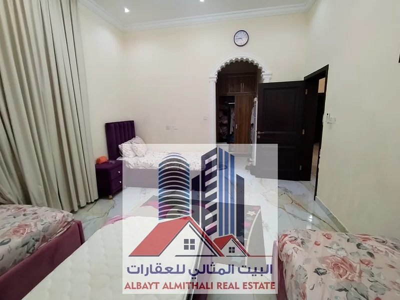 🏡 Luxury Villa for Sale – Al Mowaihat 1  📏 Plot Size: 5,000 sq. ft.   📅 Year Built: 2021   🏛 Facade: Elegant stone finish – modern and stylish des63869711818242113