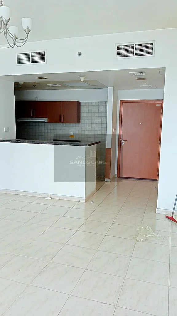 شاغر | طريق العين | شقة من غرفة نوم واحدة | أفقى سكاي كورتس برج أ63731745839874110