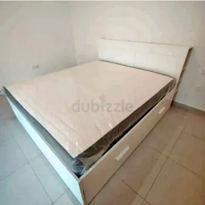 IKEA brimness king size bed with 4 storage drawers underneath and with  IKEA mattress