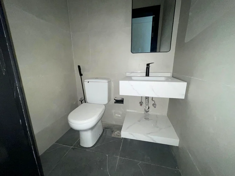 Two rooms and a hall with 3 bathrooms with a balcony, excellent view, open and high, first resident, super deluxe finishing, two master rooms with an63713506098947112