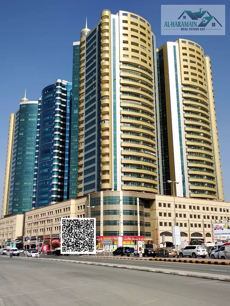 شقة واسعة من غرفتي نوم للإيجار في برج هورايزون | وسط عجمان | إطلالة مفتوحة | موقف سيارات متضمن لشبه مفروشة63709863852163110
