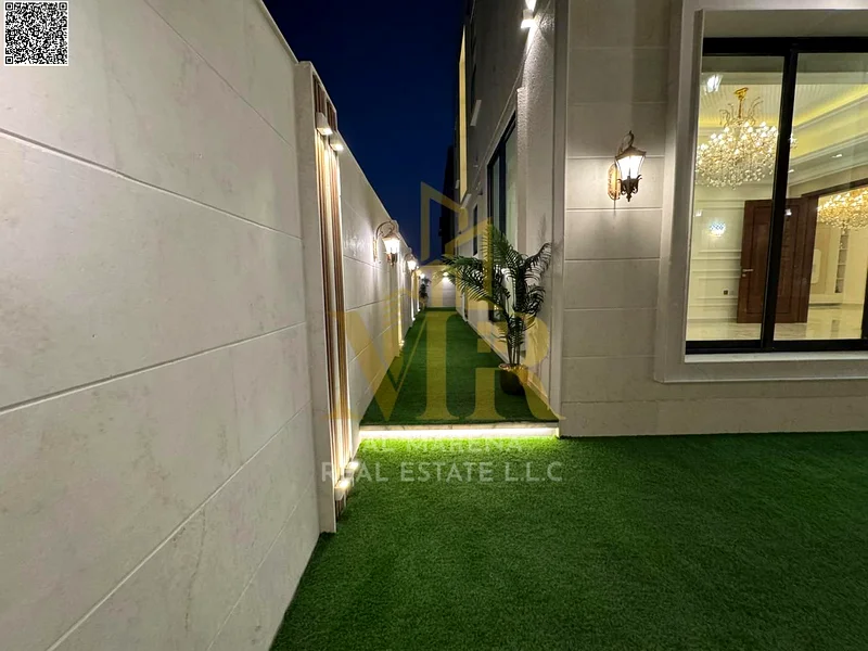 فيلا بسعر يشمل رسوم التسجيل ورسوم الملكية على الشارع الرئيسي، جاهزة للسكن في أكثر مناطق عجمان رقيًا. ملكية حرة63913651669635113