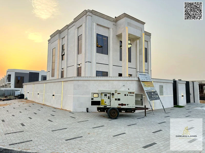 For sale - Corner villa in Al Helio 2 - Ajman | Two floors | 4 master bedrooms | Majlis and hall with sinks | Modern kitchen | Courtyard | All inclusi63910644940545111