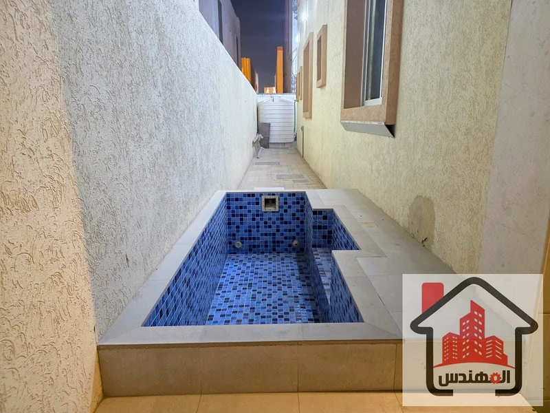 Villa for rent in Ajman, Al Yasmeen area, two floors, consisting of 5 bedrooms, a majlis, a hall, a master maid's room, and a small swimming pool. Second tenant required: AED 100,000.63718568078977111