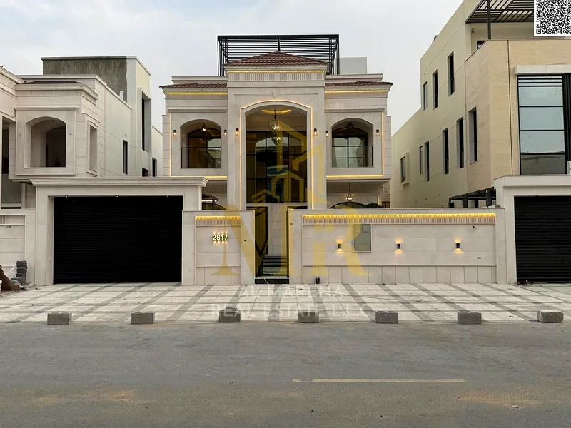 For sale, a luxurious villa in Al Bahia - Ajman | Two floors + roof | 5 master bedrooms + majlis + 2 halls + front yard + roof seating area | Land are63883873956482112