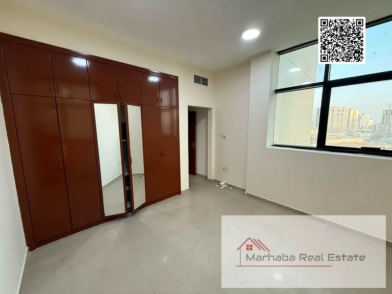 شقة مكونة من غرفتين وصالة متاحة للبيع بسعر 415,000/-درهم في برج رشيديه63888603532033112