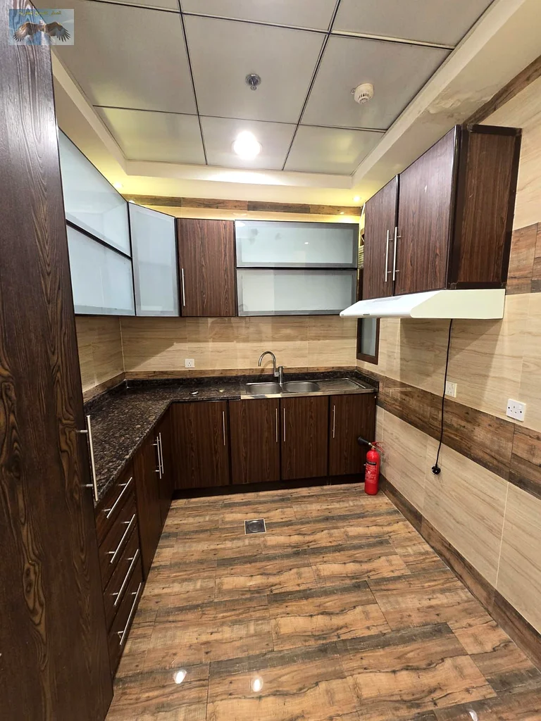 1BR + Hall for yearly rent in Ajman, Al Rawda 3, off Sheikh Khalifa St, with parking, excellent finishes, near all services, easy access to Dubai & Sh63719604490755111
