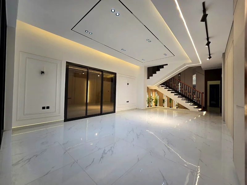 Villa for sale in Ajman, Al Helio 2 area, including registration and ownership fees, consisting of 5 master bedrooms with a majlis, a hall, and a maid63910418063746114