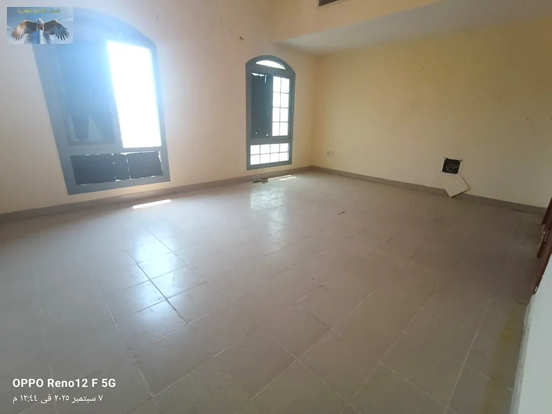 For annual rent, a luxurious townhouse in Al Zahia area, directly on Mohammed bin Zayed Road. It consists of two bedrooms, a hall, 3 bathrooms, 2 balc63710892363010113
