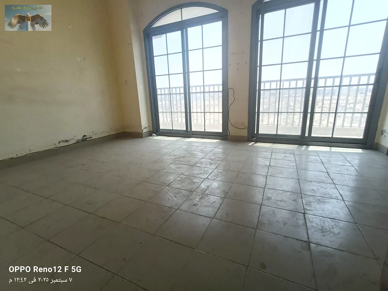 For annual rent, a luxurious townhouse in Al Zahia area, directly on Mohammed bin Zayed Road. It consists of two bedrooms, a hall, 3 bathrooms, 2 balc63710892363010112