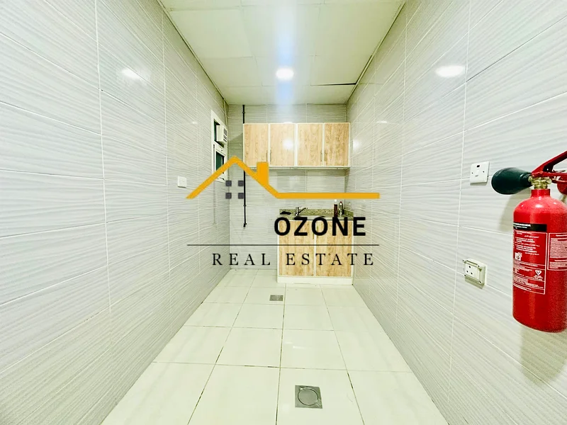 Huge size | Saperate kitchin | Near sharjha airport | FREE parking outside |63706317139842111