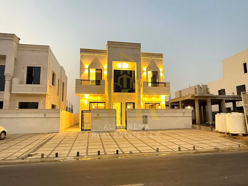 5-room villa with a classic design, a prime location on a main street in Al Helio 2, Ajman, including registration fees and electricity, bank financin63911730008962113