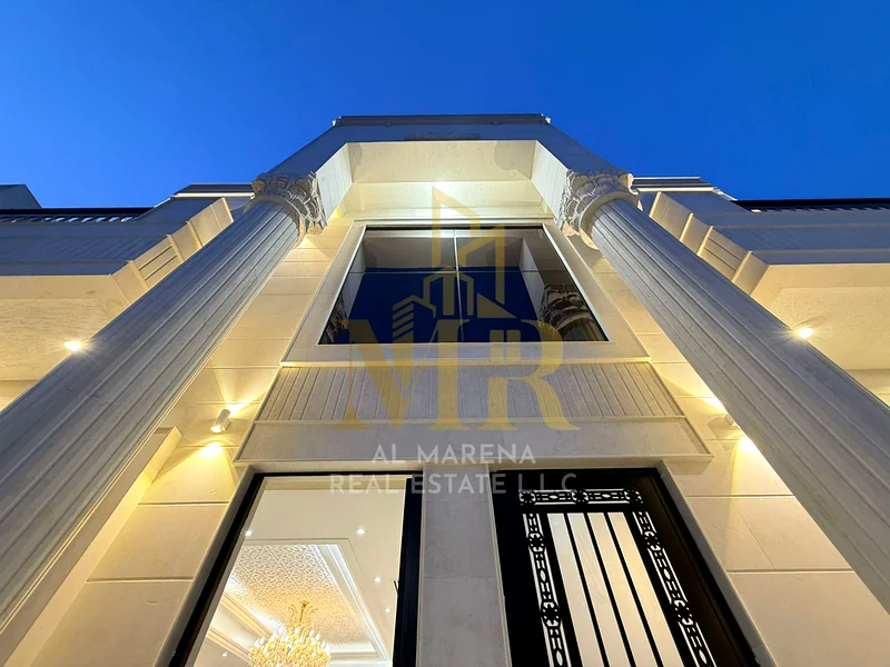 5-room villa with a classic design, a prime location on a main street in Al Helio 2, Ajman, including registration fees and electricity, bank financin63911730008962114