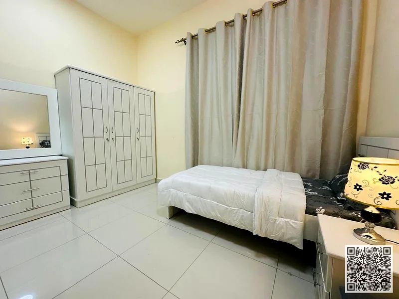 For monthly rent in Ajman - two-bedroom apartment with a balcony, a distinctive open view, fully furnished with elegant furniture, and a fully equippe63837480053250112