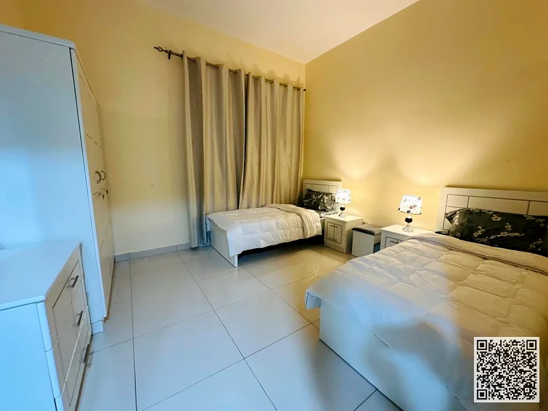 For monthly rent in Ajman - two-bedroom apartment with a balcony, a distinctive open view, fully furnished with elegant furniture, and a fully equippe63837480053250111
