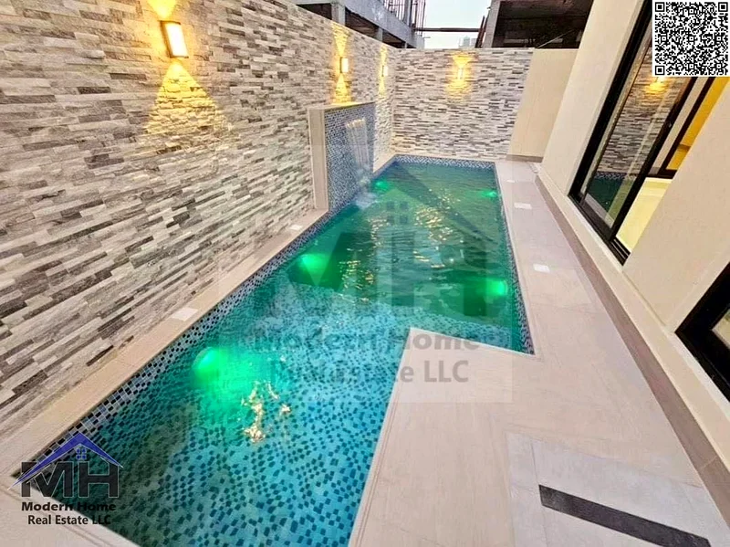 At a price that includes fees, electricity, central AC own a villa with roof and a pool in Ajman. first resident, freehold, central AC, super deluxe63911938196737113