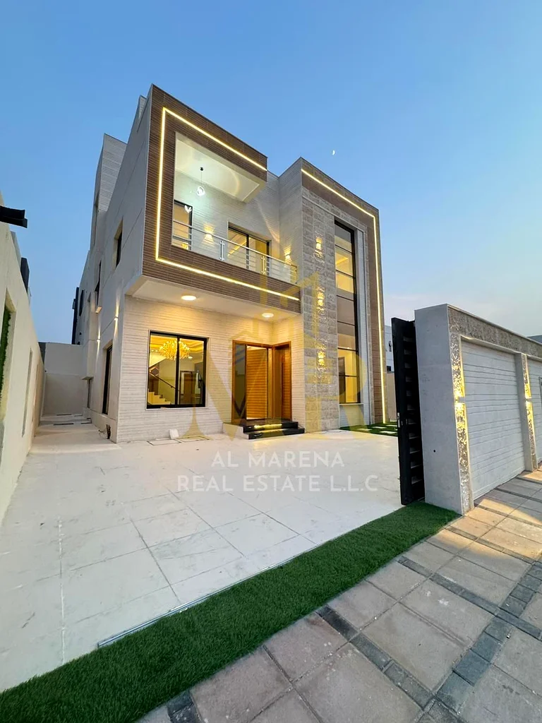 Luxury modern villa for sale in Al Helio 2, Ajman | 4 master bedrooms + maid | High-end finishes | Spacious area | Prime location and close to all ser63911300385793113