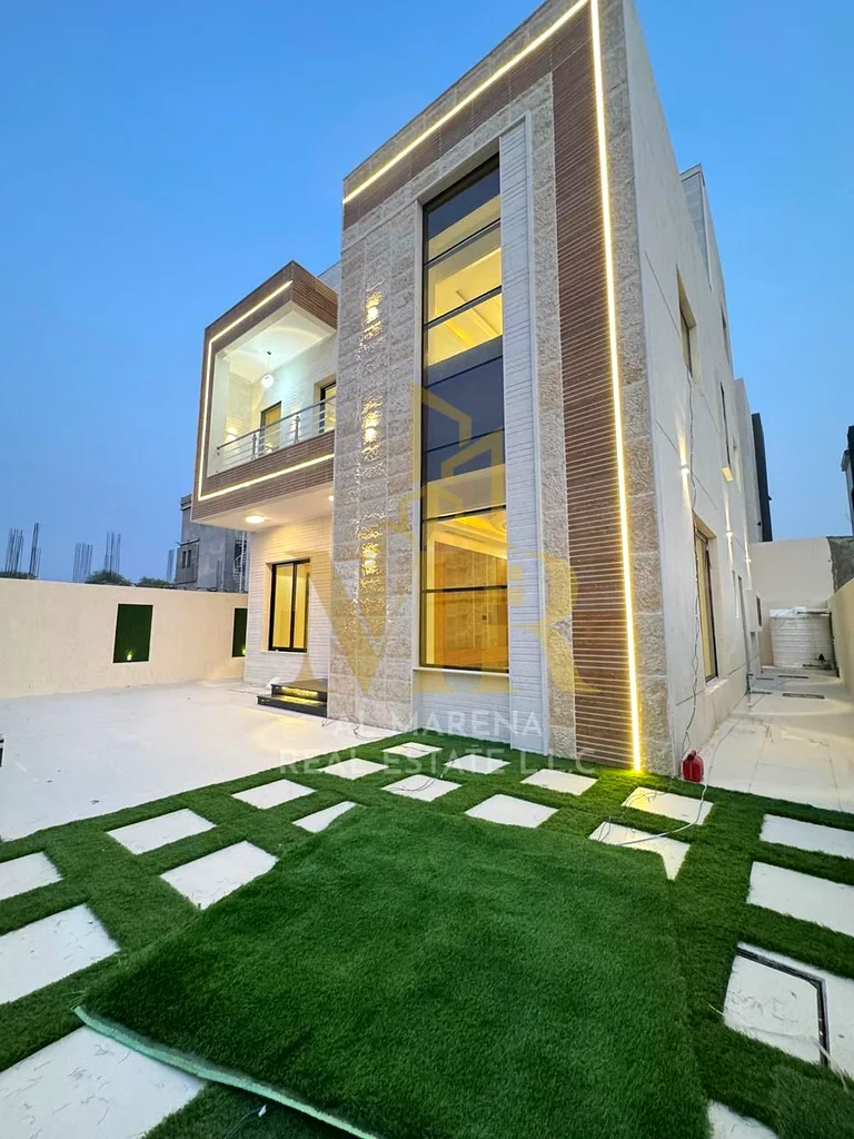 Luxury modern villa for sale in Al Helio 2, Ajman | 4 master bedrooms + maid | High-end finishes | Spacious area | Prime location and close to all ser63911300385793112