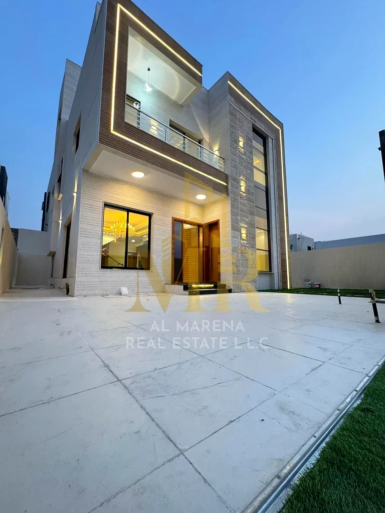 Luxury modern villa for sale in Al Helio 2, Ajman | 4 master bedrooms + maid | High-end finishes | Spacious area | Prime location and close to all ser63911300385793114