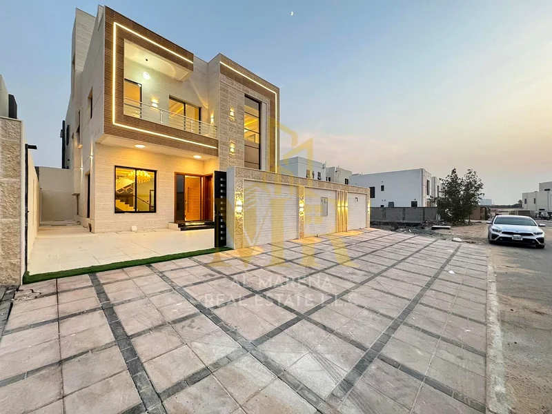 Luxury modern villa for sale in Al Helio 2, Ajman | 4 master bedrooms + maid | High-end finishes | Spacious area | Prime location and close to all ser63911300385793111