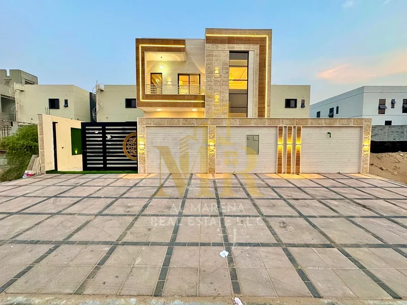 Luxury modern villa for sale in Al Helio 2, Ajman | 4 master bedrooms + maid | High-end finishes | Spacious area | Prime location and close to all ser63911300385793110