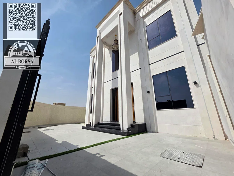 🏡 For sale, a corner villa in Al Helio 2, Ajman, 4 master bedrooms, a majlis, a hall, and all rooms are equipped with built-in wardrobes, at an attra63911300368897114
