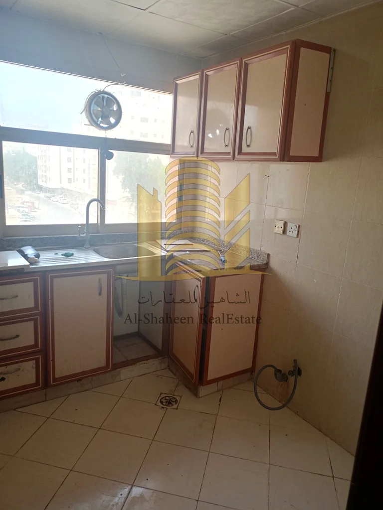 شقة مكونة من غرفتين نوم للإيجار السنوي في الرشيدية 2، بجوار أبراج فالكون.63721701103619114