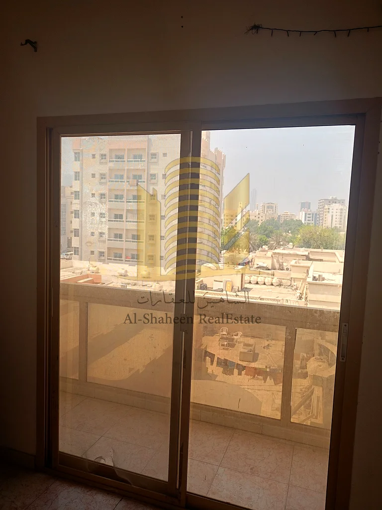 شقة مكونة من غرفتين نوم للإيجار السنوي في الرشيدية 2، بجوار أبراج فالكون.63721701103619112