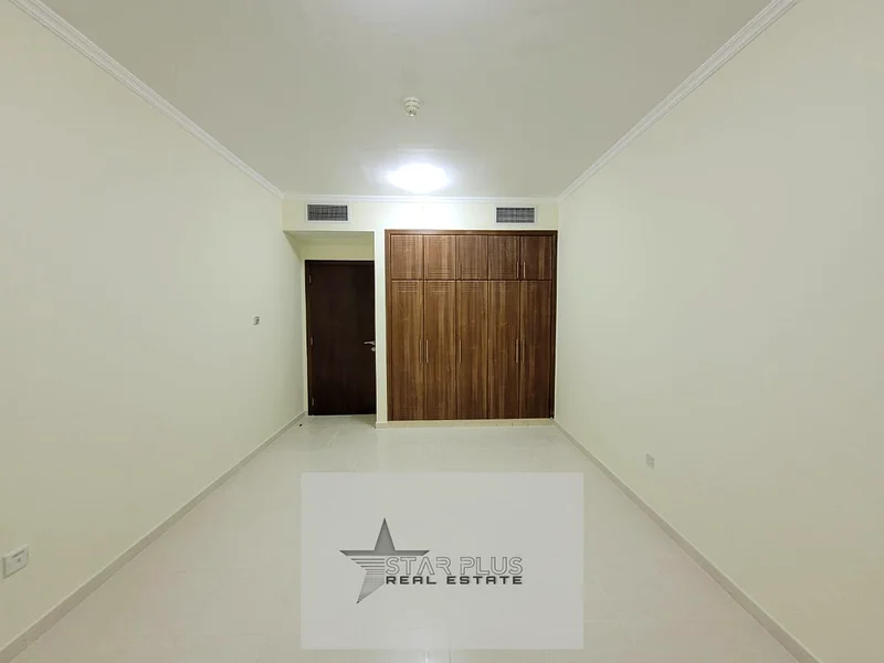 شقة 2 غرفة نوم بالقرب من المخرج مع مسبح ووقوف للسيارات.63730149703426111