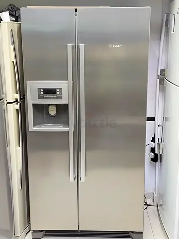 Modern Bosch Refrigerator with Water Dispenser - A Must-Have for Every Kitchen!
