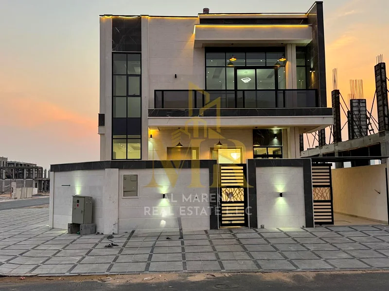 A villa with a price including registration and ownership fees on the main street, ready for occupancy in the most upscale areas of Ajman, freehold fo63911300420098111